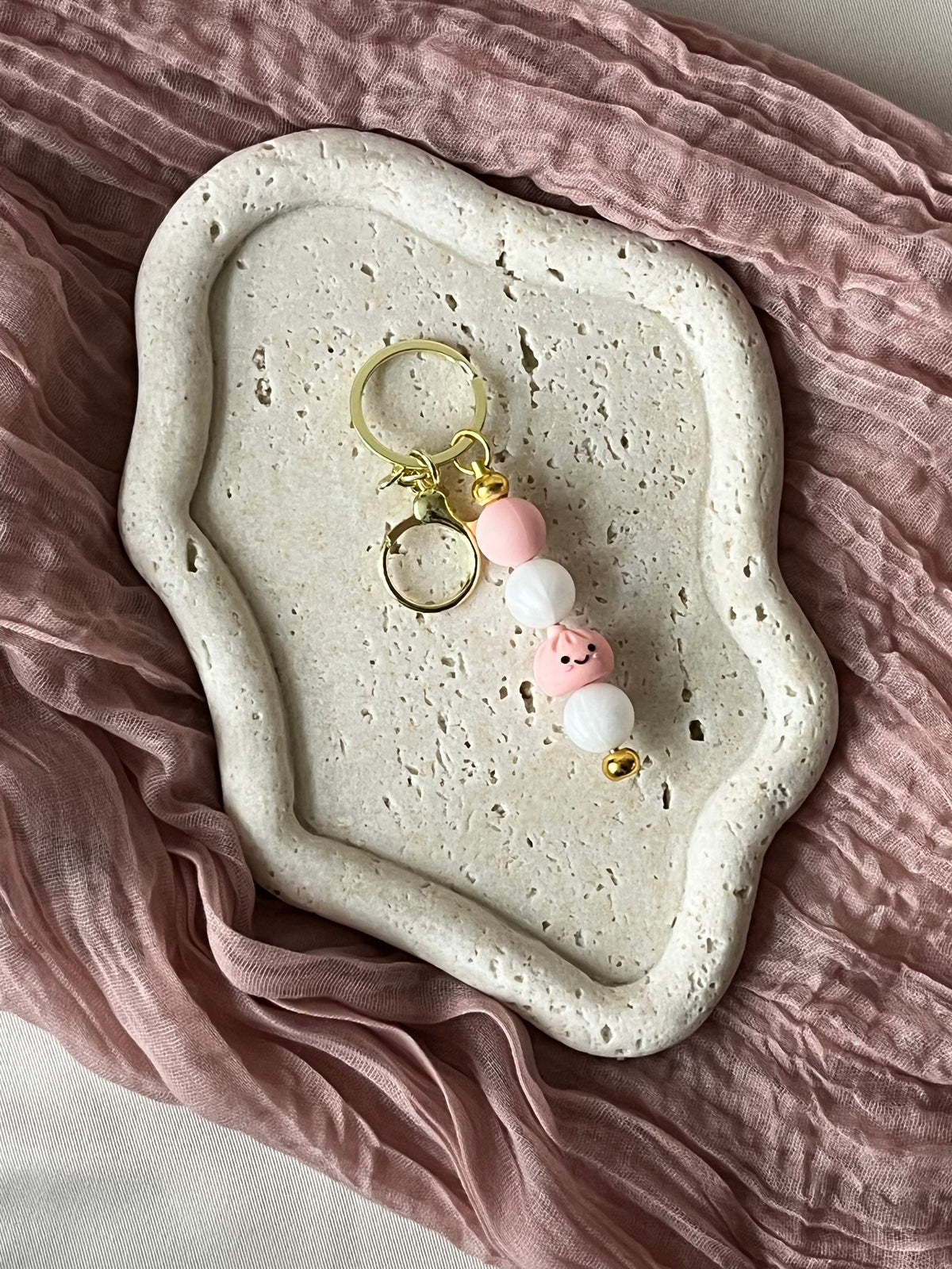 Sleutelhanger dumpling kralen – schattig handgemaakt cadeau